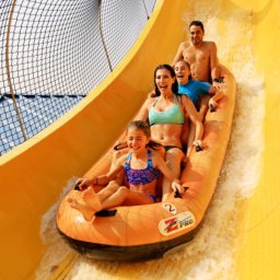 Water World Colorado - family riding Mile High Flyer